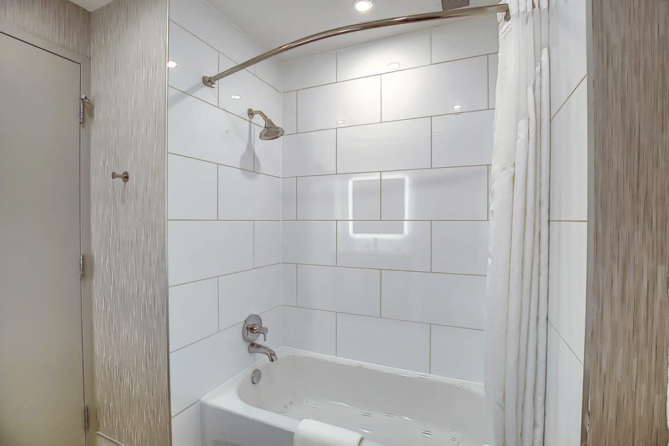 Standard Room, 2 Queen Beds | Bathroom | Combined shower/tub, towels, soap, shampoo