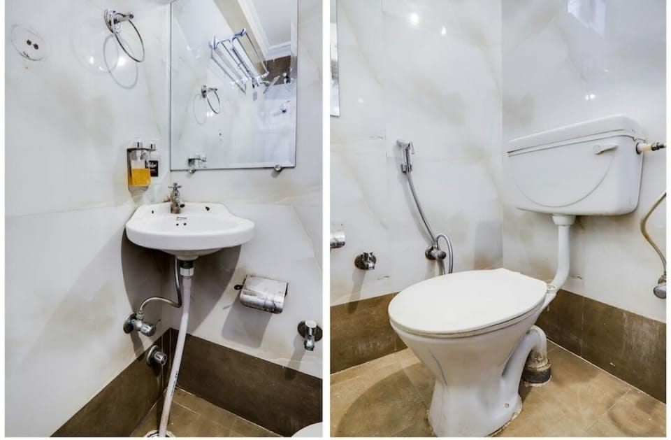 Deluxe A/C Room | Bathroom | Shower, towels