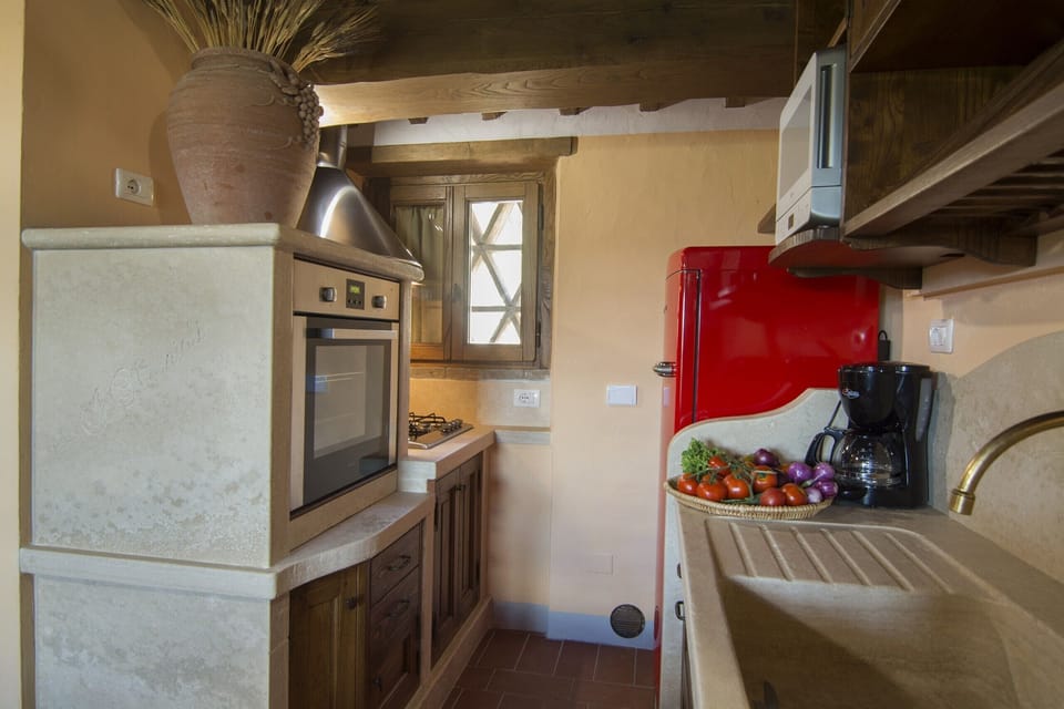 Apartment, 1 Bedroom, Smoking, Pool Access | Private kitchen | Microwave, coffee/tea maker, cookware/dishes/utensils