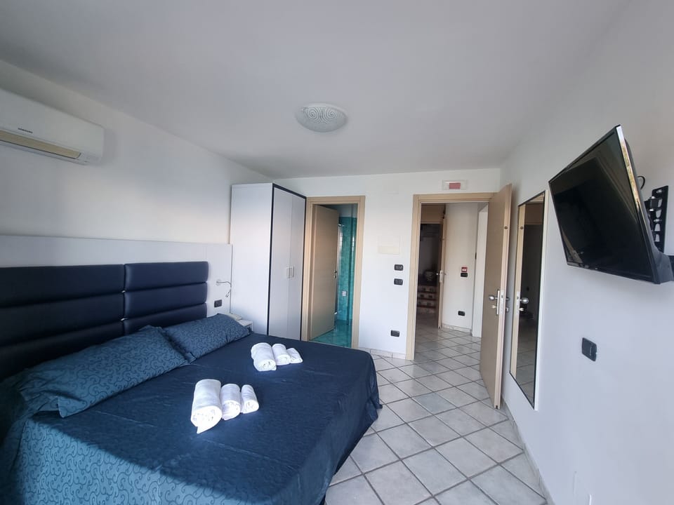 Junior Suite, 1 Bedroom, Terrace, Sea View | Minibar, in-room safe, desk, cribs/infant beds