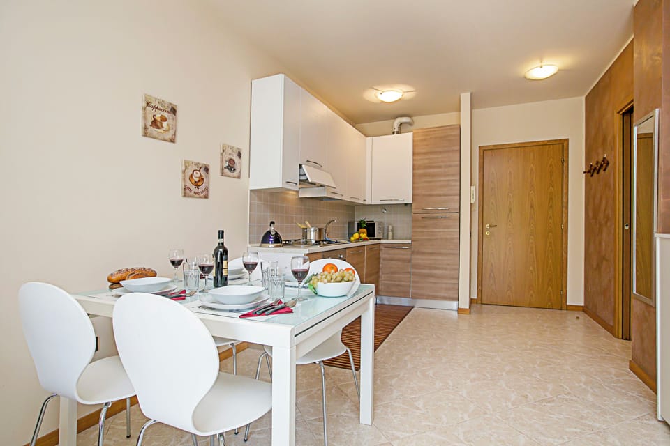 Family Apartment, 1 Bedroom, Microwave (Casa Kristall Lago) | Private kitchen | Full-size fridge, microwave, oven, stovetop