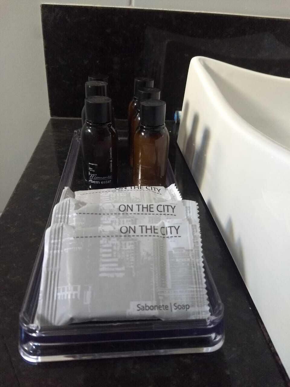 Basic Twin Room | Bathroom amenities | Shower, towels, soap, shampoo