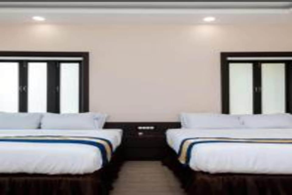 Family Room | Blackout drapes, soundproofing, free WiFi, bed sheets