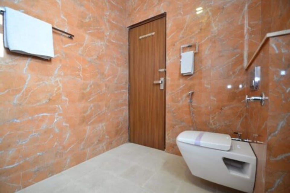 Shower, free toiletries, slippers, towels