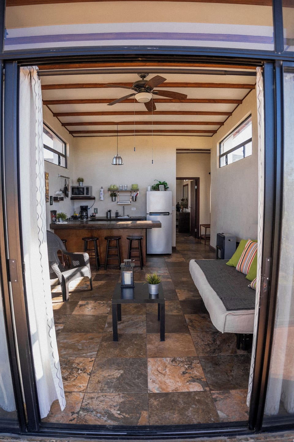 Full-size fridge, microwave, stovetop, coffee/tea maker
