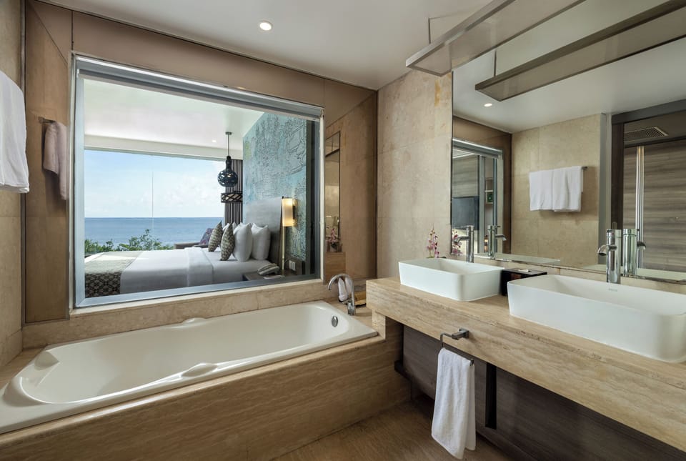 Suite, 1 King Bed, Ocean View | Bathroom | Shower, free toiletries, hair dryer, slippers