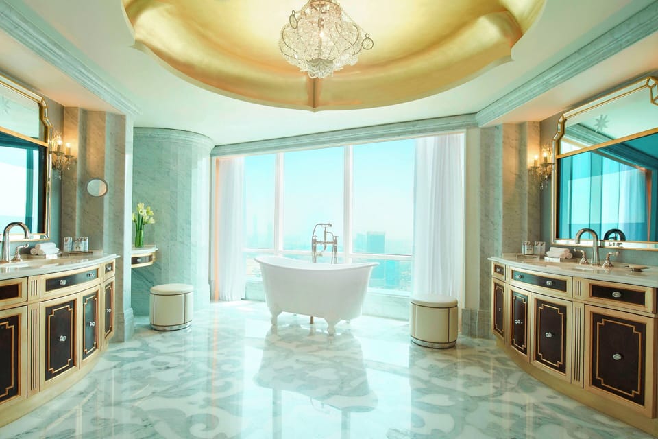 Suite, 1 Bedroom, Sea View | Bathroom | Separate tub and shower, hair dryer, bathrobes, slippers
