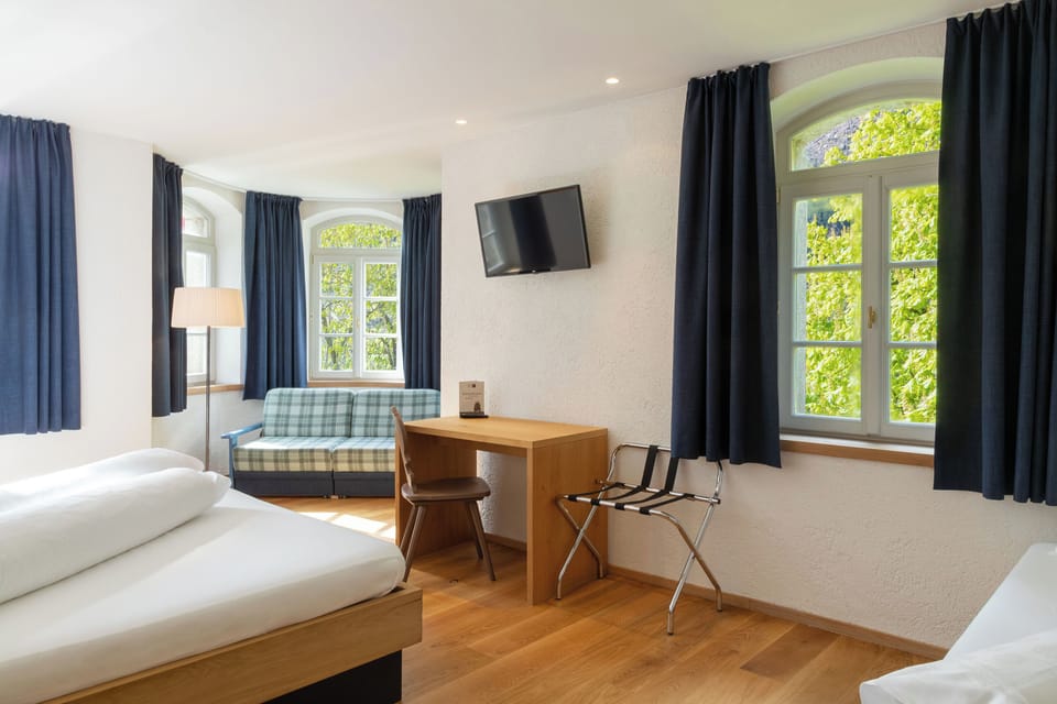 Triple Room, Private Bathroom | Hypo-allergenic bedding, individually furnished, desk, laptop workspace
