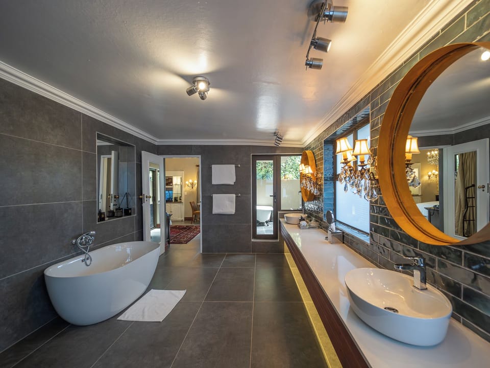 Luxury Suite, 1 King Bed | Bathroom | Separate tub and shower, deep soaking tub, free toiletries, hair dryer