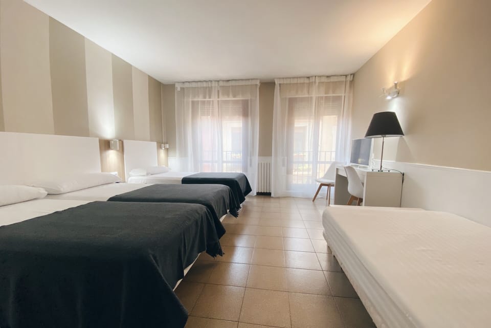 Family Quadruple Room | 1 bedroom, pillowtop beds, desk, soundproofing