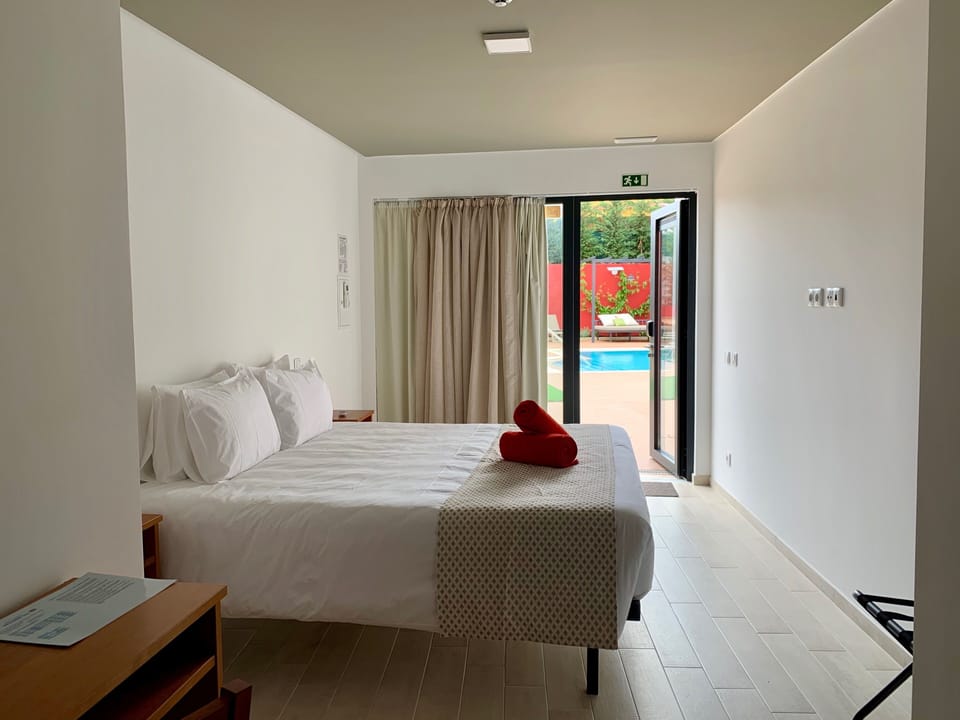 Double Room, Pool View | In-room safe, blackout drapes, soundproofing, free WiFi
