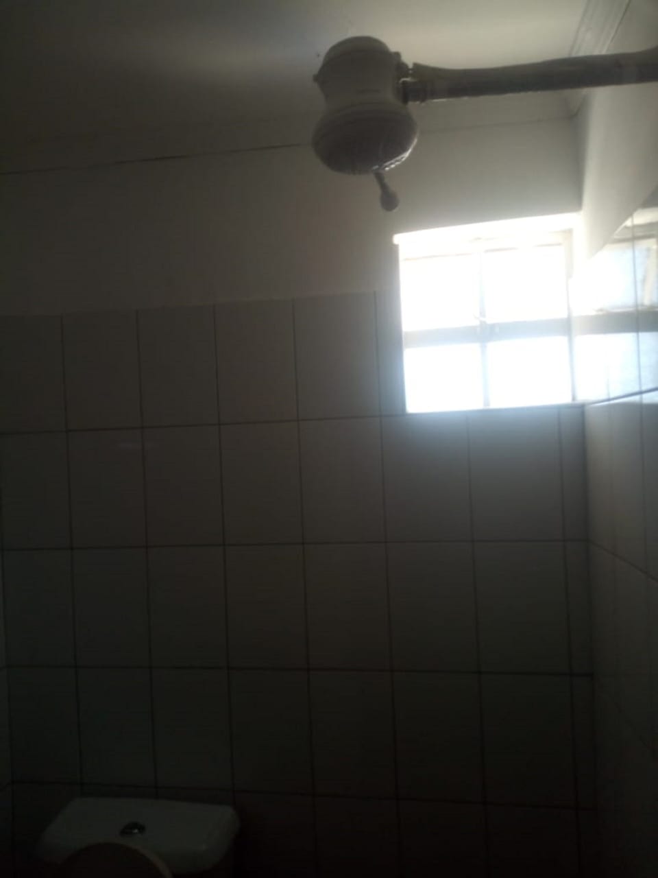 Basic Double Room | Bathroom | Shower, rainfall showerhead, towels, soap