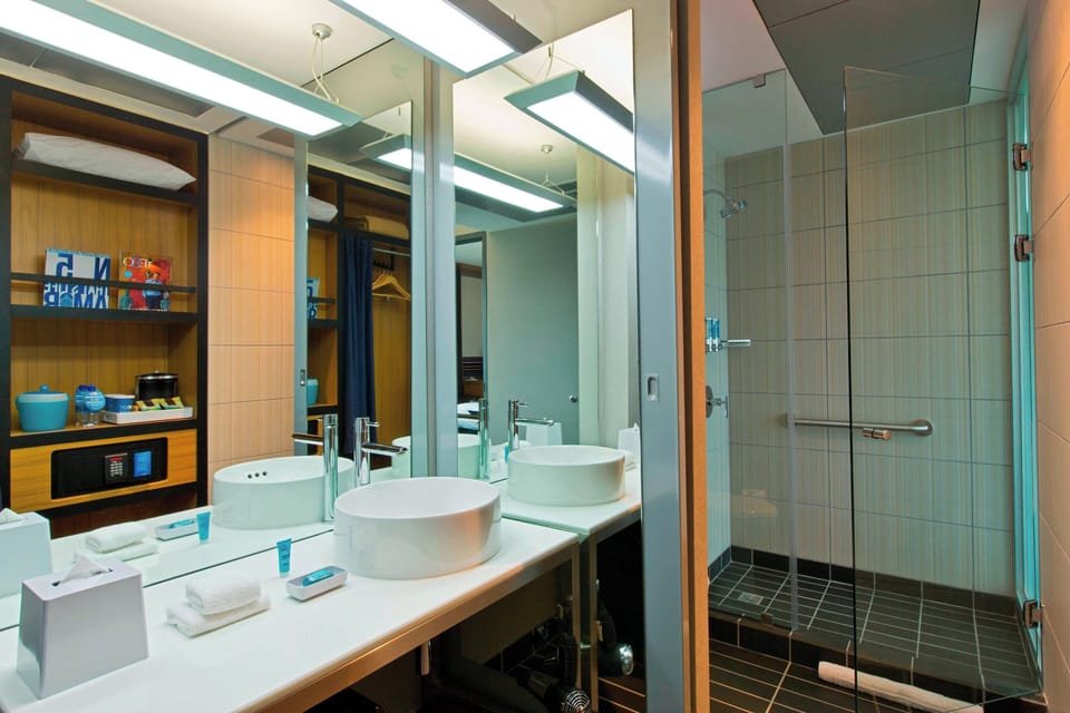 aloft, Room, 2 Double Beds | Bathroom | Shower, designer toiletries, hair dryer, towels