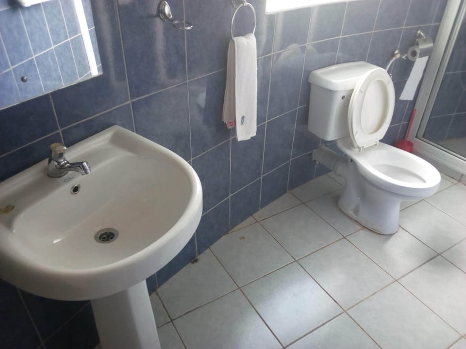 Shower, free toiletries, slippers, towels