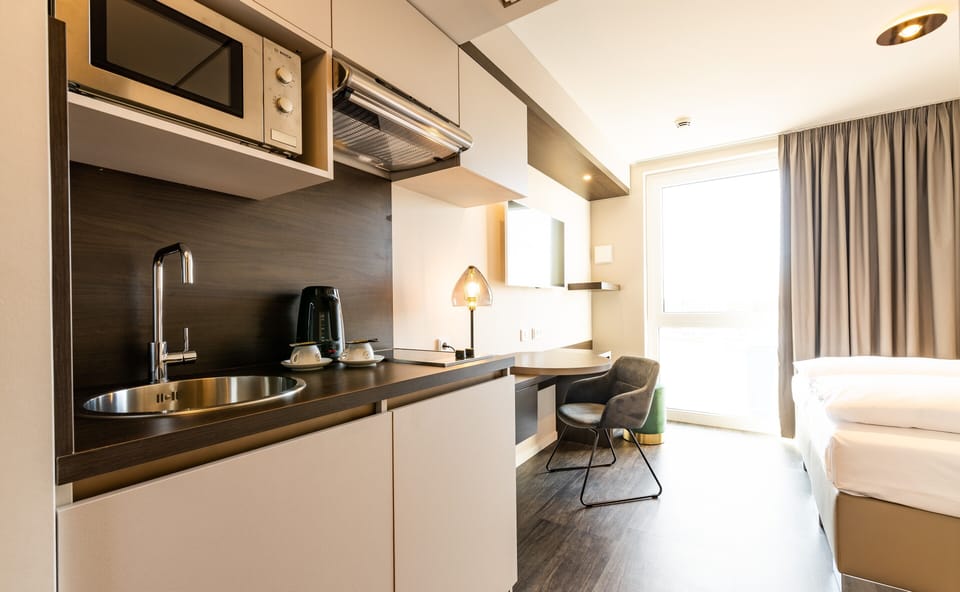 Fridge, electric kettle, highchair