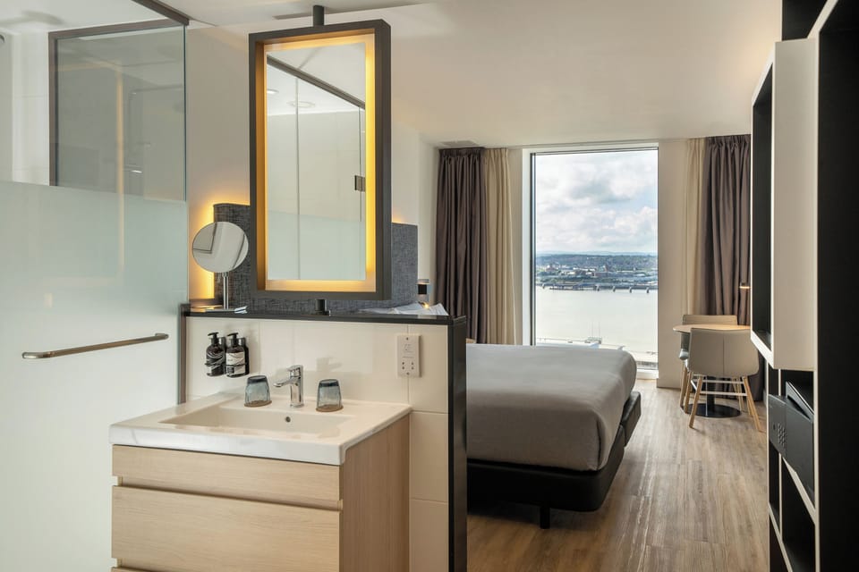 Eco-friendly toiletries, hair dryer, towels