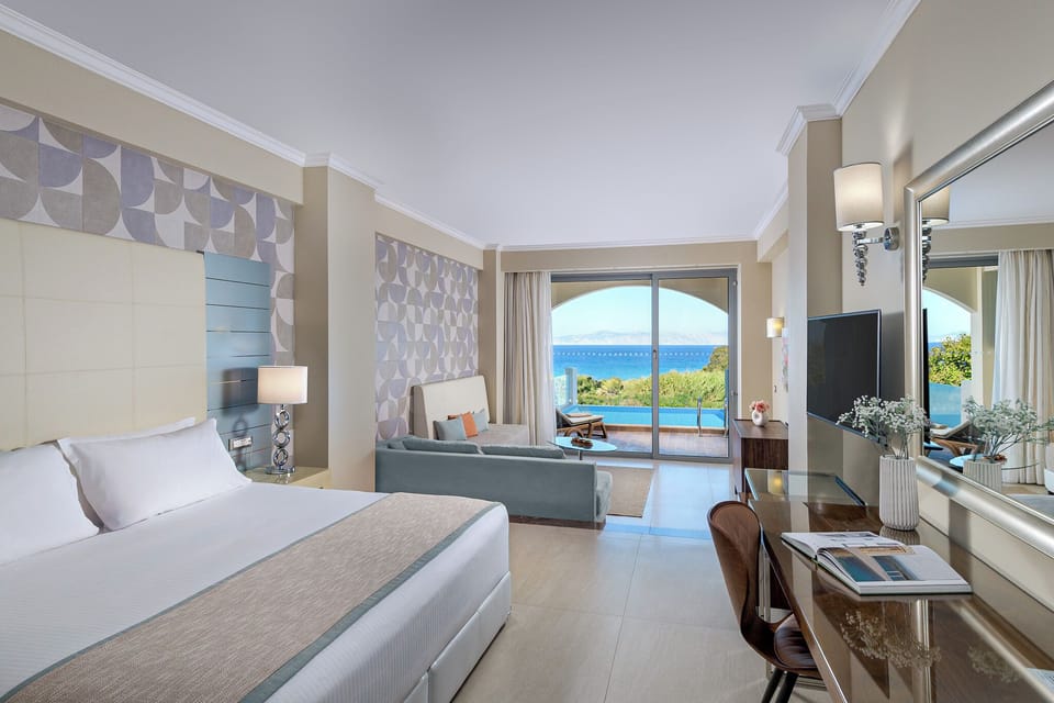 Junior Suite, Private Pool, Partial Sea View | Minibar, in-room safe, free cribs/infant beds, free WiFi