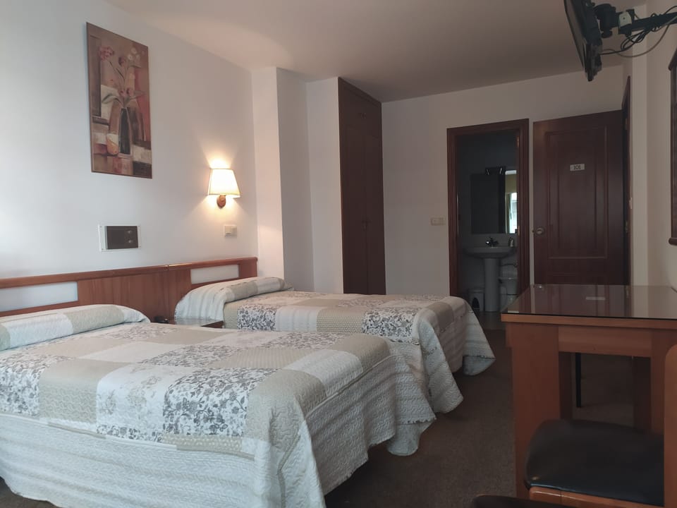 Double or Twin Room | Desk, iron/ironing board, rollaway beds, free WiFi