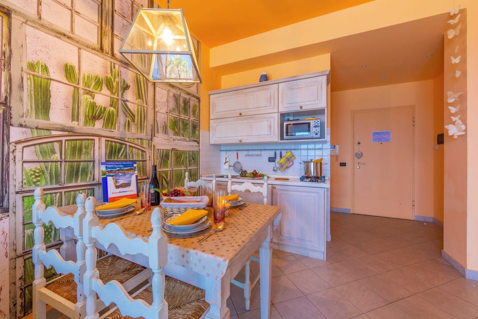 Family Apartment, Multiple Bedrooms, Sea Facing (Laigueglia Beach) | Private kitchen | Full-size fridge, microwave, oven, stovetop