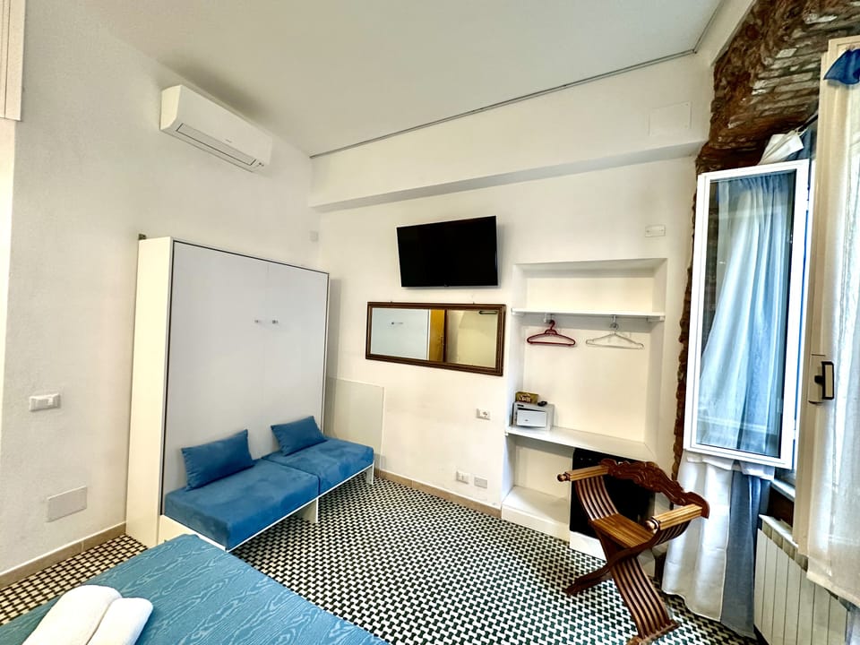 Premium Quadruple Room | In-room safe, free WiFi, bed sheets
