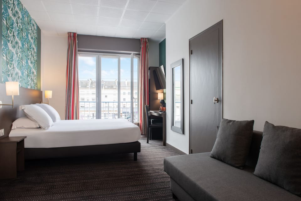 Deluxe Room, 1 Queen Bed with Sofa bed | In-room safe, desk, laptop workspace, blackout drapes