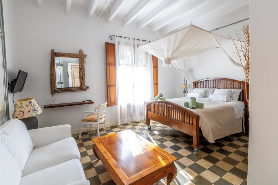 Suite | Down comforters, Select Comfort beds, in-room safe, soundproofing