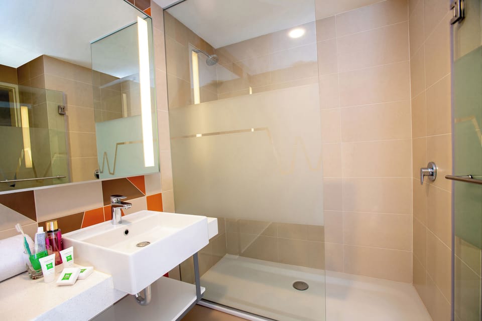 Shower, rainfall showerhead, eco-friendly toiletries, hair dryer