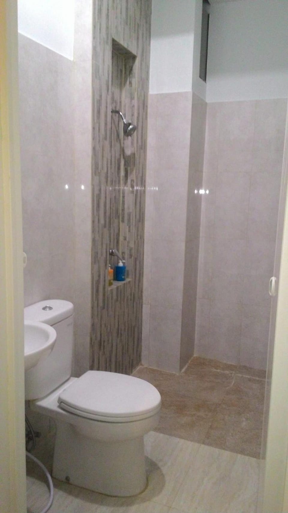 Shower, towels, soap, shampoo