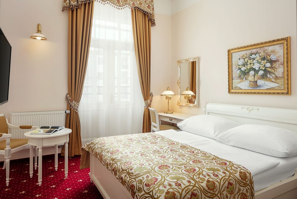 Standard Double or Twin Room | Minibar, in-room safe, desk, blackout drapes