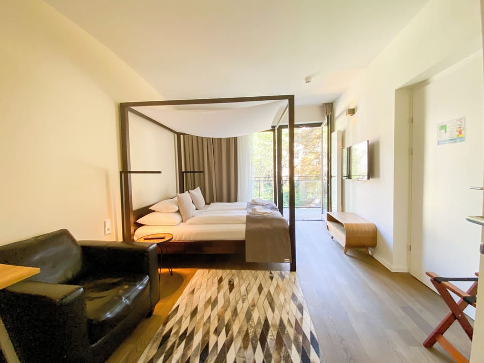 Deluxe Double Room, Balcony (stay small) | Minibar, in-room safe, individually decorated, laptop workspace