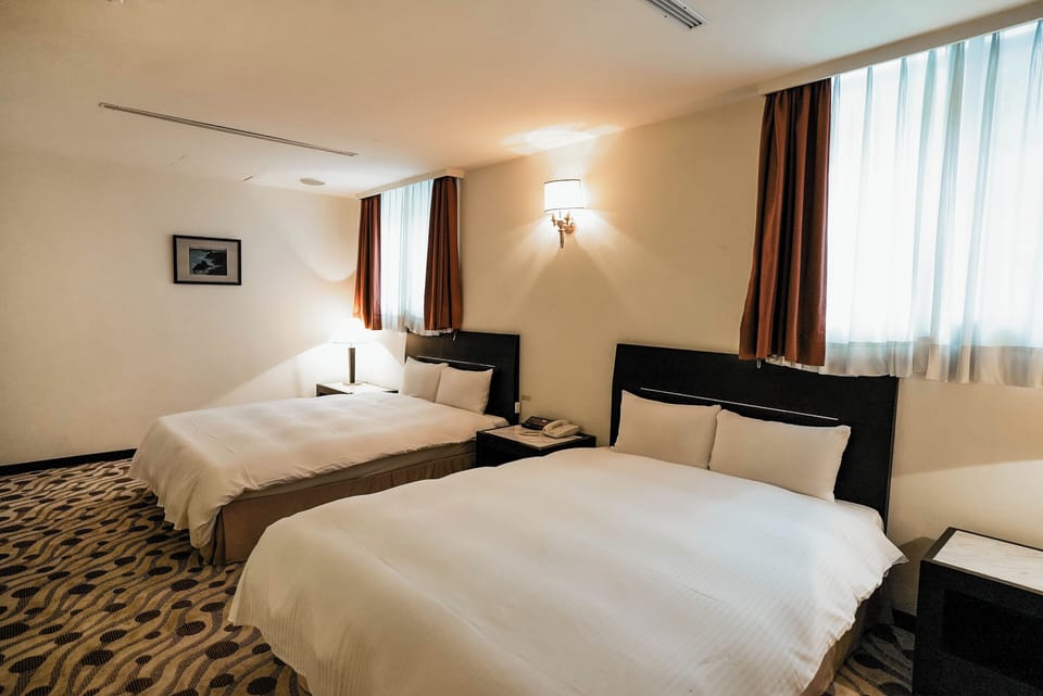 Standard Quadruple Room, 2 Queen Beds | Down comforters, in-room safe, desk, blackout drapes