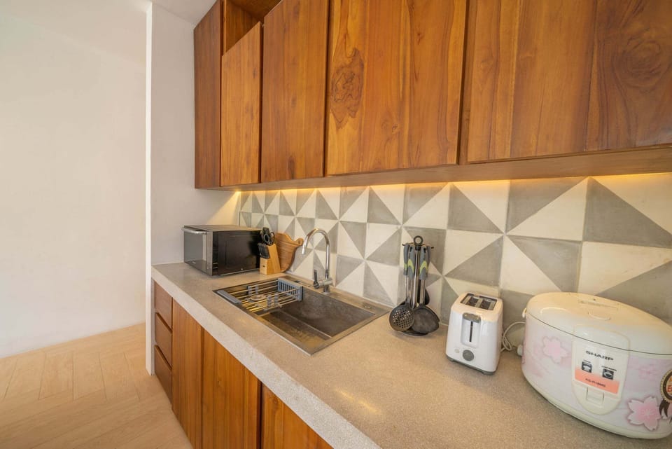 Villa, 4 Bedrooms | Private kitchenette | Fridge, microwave, stovetop, cookware/dishes/utensils