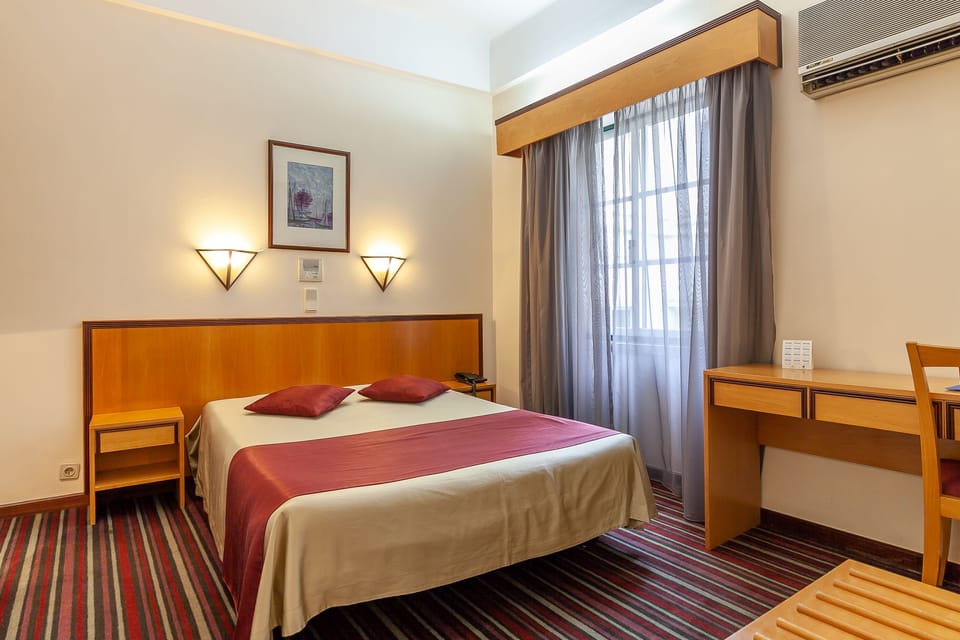 Standard Double or Twin Room | Desk, free cribs/infant beds, free WiFi, bed sheets