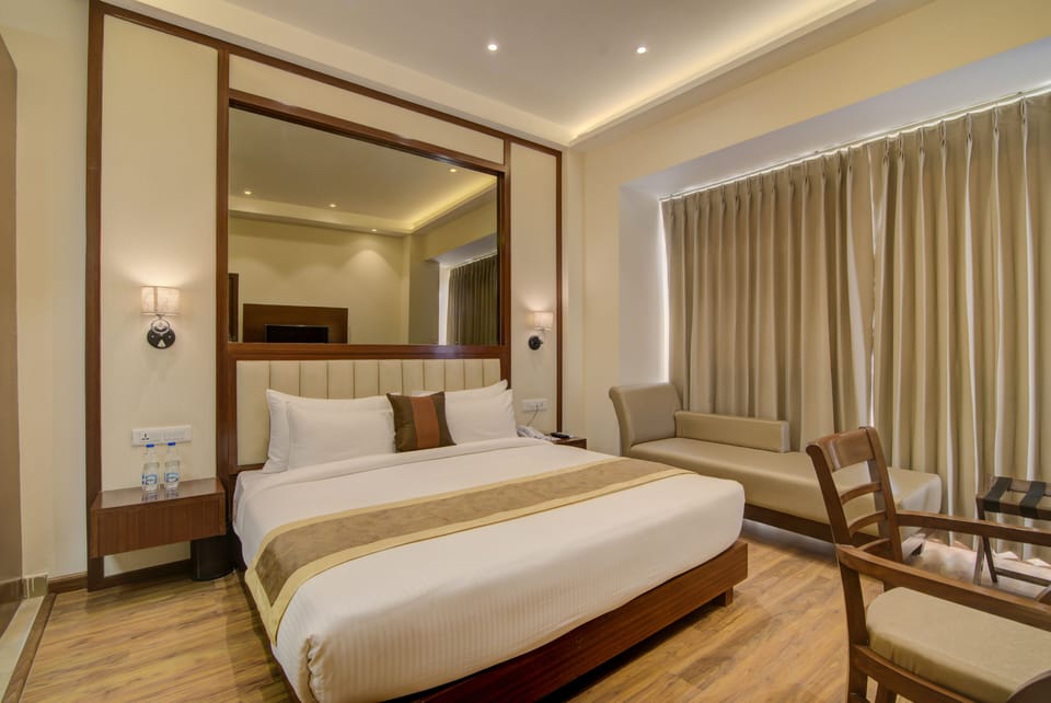 Executive Room | Premium bedding, minibar, in-room safe, individually furnished
