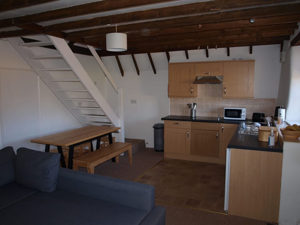 Comfort Apartment, 2 Bedrooms | Living area | 32-inch Smart TV with premium channels