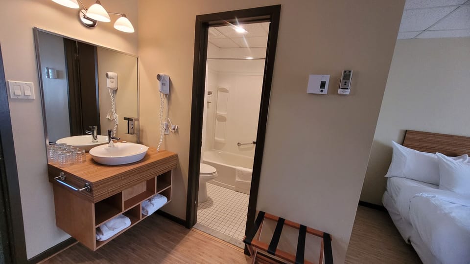 Comfort Room, 2 Double Beds | Bathroom | Hair dryer, towels