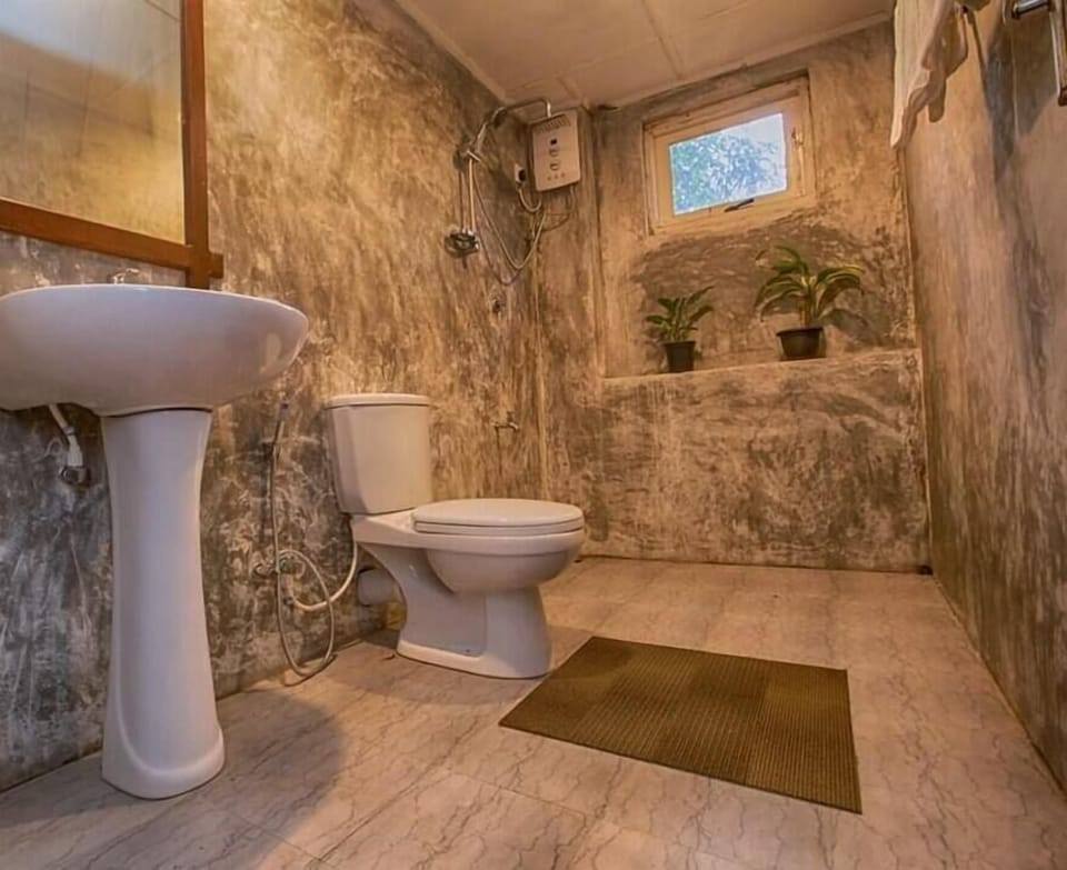Deluxe Villa, 2 Bedrooms | Bathroom | Shower, hydromassage showerhead, towels, soap