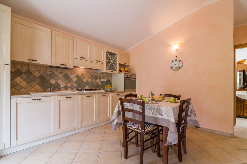 Apartment, 2 Bedrooms | Private kitchen | Full-size fridge, stovetop, dishwasher, cookware/dishes/utensils