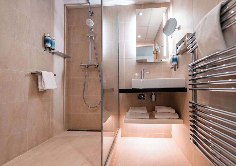 Hair dryer, bathrobes, slippers, towels