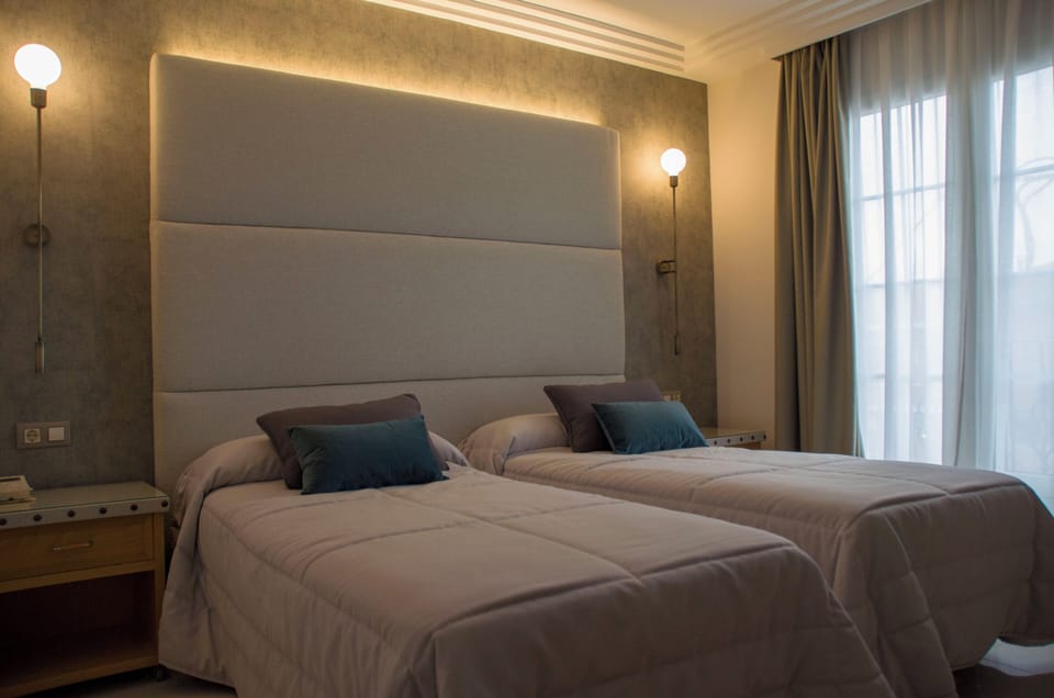 Desk, blackout drapes, free WiFi, bed sheets
