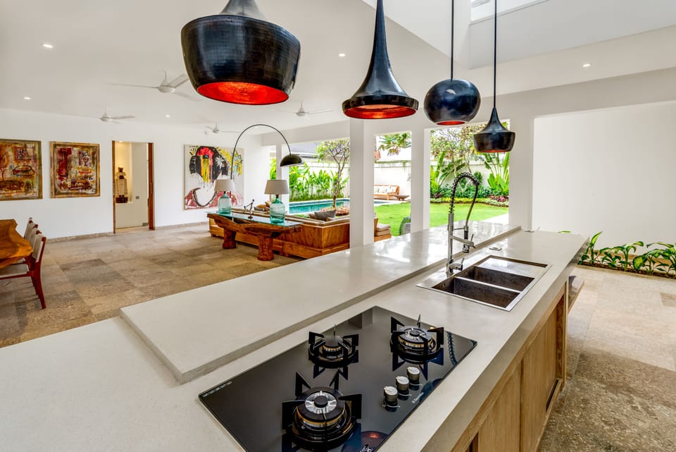 Villa Momentai | Private kitchen | Fridge, highchair