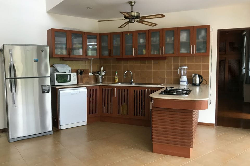 Villa, 3 Bedrooms, Non Smoking, Kitchen | Shared kitchen | Full-size fridge, microwave, oven, stovetop