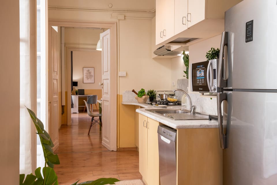 Apartment, 2 Bedrooms | Private kitchen | Full-size fridge, stovetop, highchair, cookware/dishes/utensils