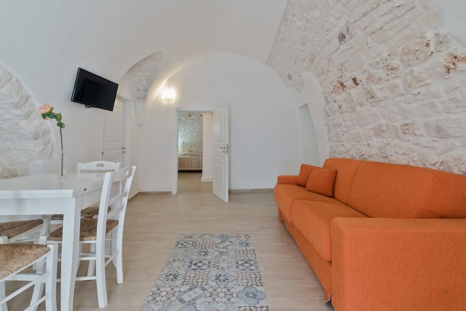 Apartment, 1 Bedroom | Living area | Flat-screen TV