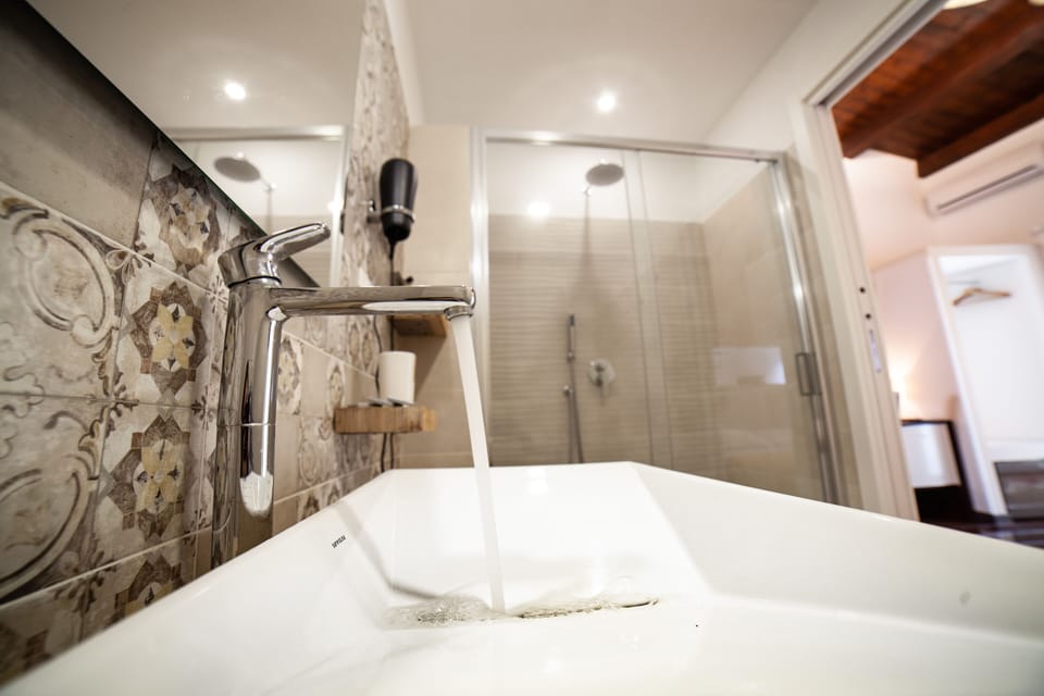 Triple Room, Patio | Bathroom | Shower, eco-friendly toiletries, hair dryer, bidet