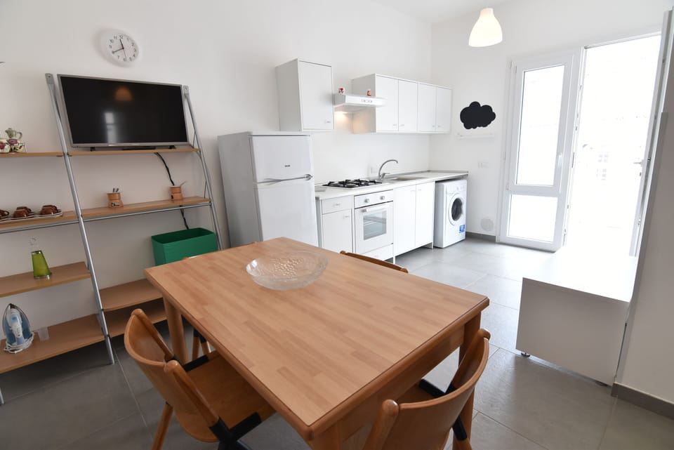 Apartment, 2 Bedrooms (Santa) | Private kitchen | Full-size fridge, oven, stovetop, cookware/dishes/utensils