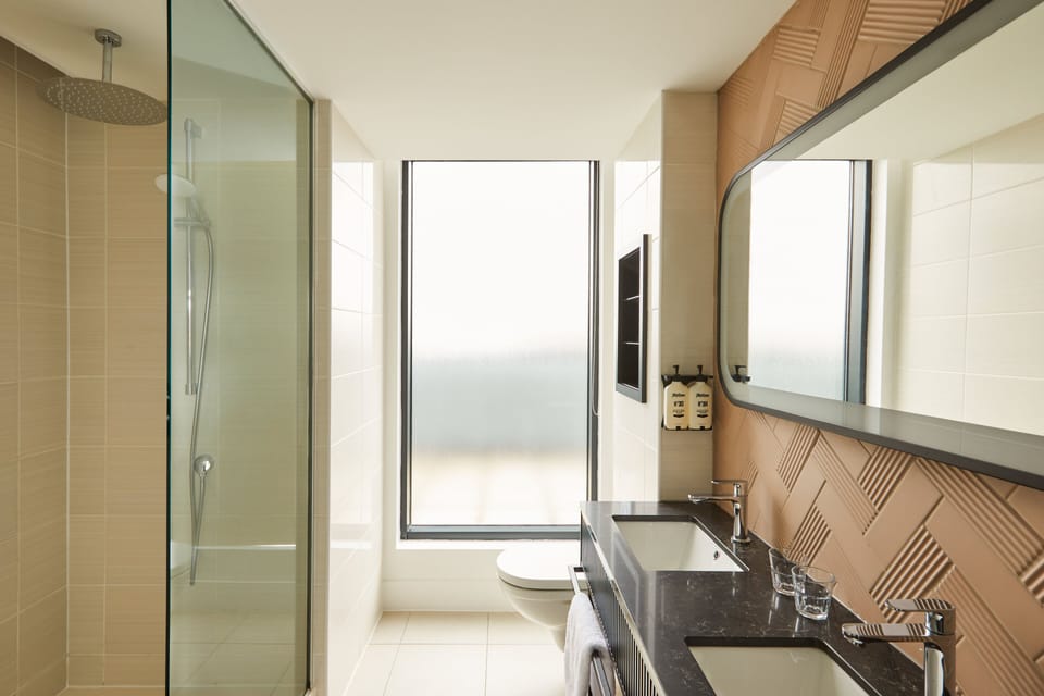 Room, 1 King Bed, City View, Corner (Super King, Refurbished, Balcony) | Bathroom | Shower, rainfall showerhead, free toiletries, hair dryer