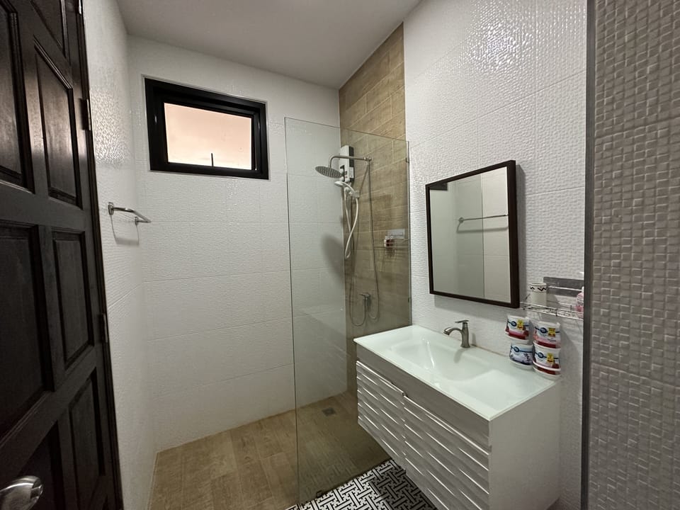 Superior King Room With Balcony | Bathroom | Shower, rainfall showerhead, hair dryer, slippers