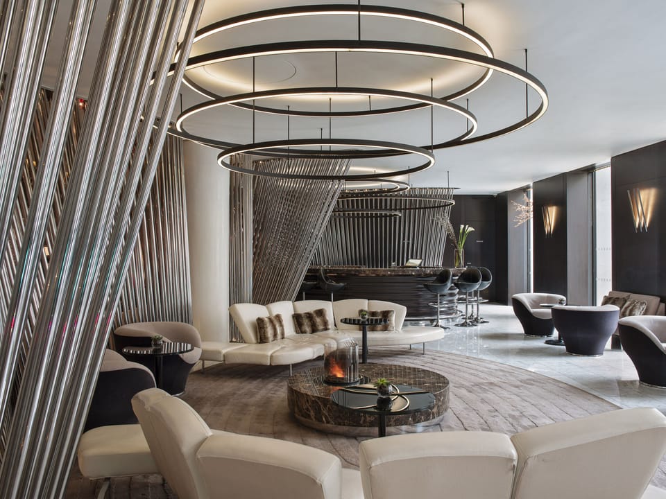 2 bars/lounges, rooftop bar, lobby lounge