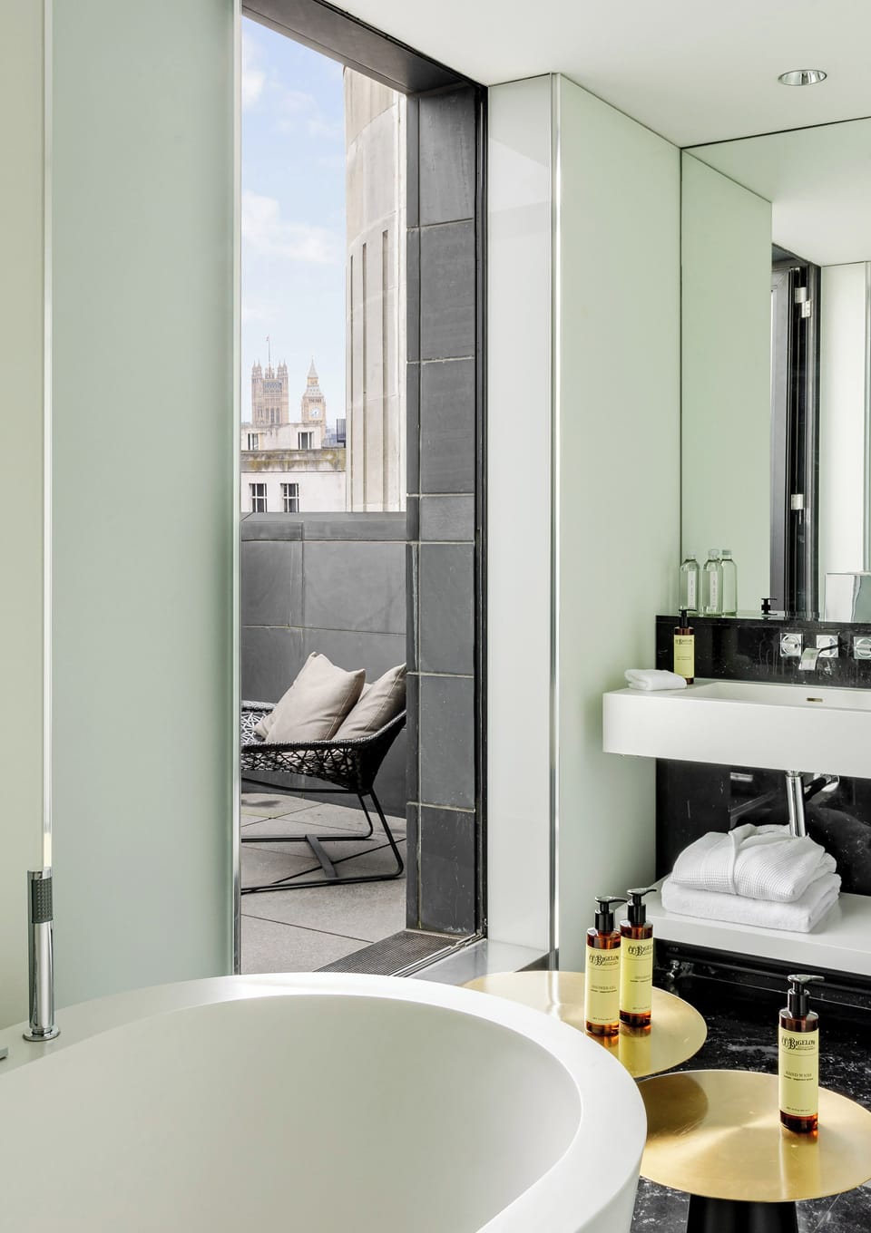 Designer toiletries, hair dryer, bathrobes, slippers